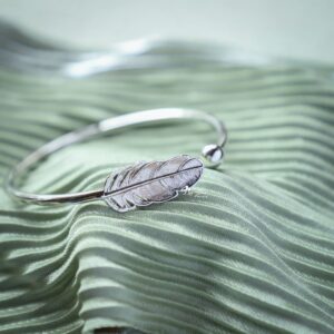 Feather And Ball Flexible Bracelet