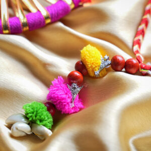 Trishringa Loomba cum Earrings rakhi