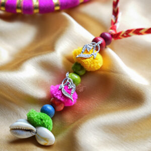 Aabhar Loomba cum Earrings Rakhi