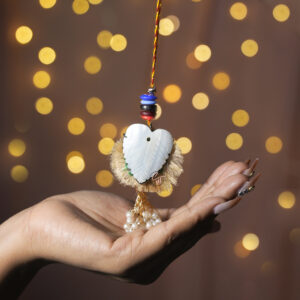 Parijaat Pankh Loomba cum Pendant Rakhi