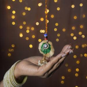 Utkrisht Solitaire Loomba cum Pendant Rakhi