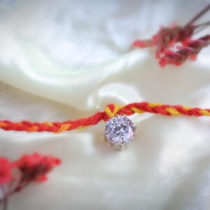 Solitaire rakhi cum Pendant